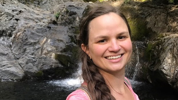 Kayleigh King in front of waterfall