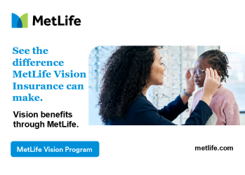 A young girl getting fitted for glasses