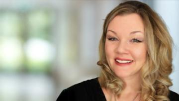 Close up of Taylor Linke, smiling